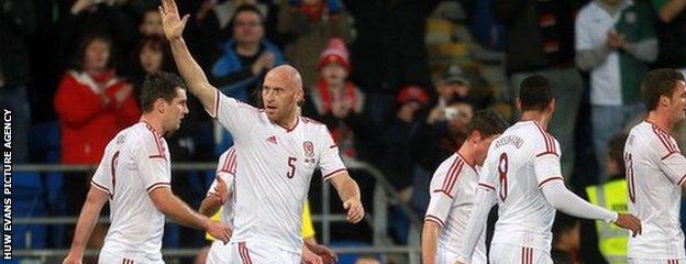James Collins celebrates goal in March 2014 friendly against Iceland