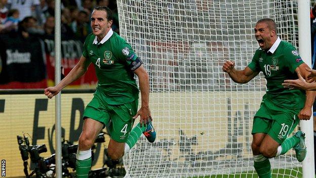 Republic of Ireland defender John O'Shea celebrates his last gasp equaliser against Germany