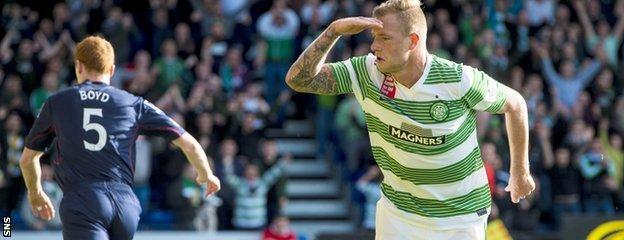 Striker John Guidetti celebrates after opening the scoring for Celtic away to Ross County