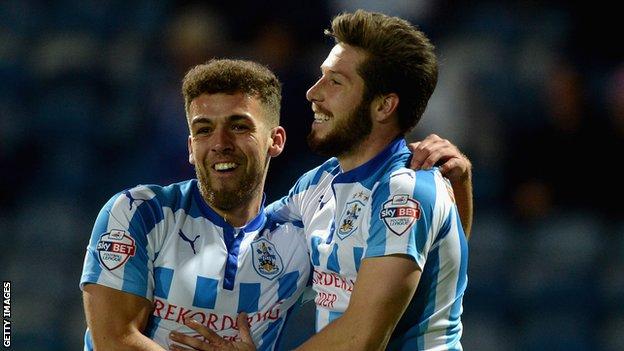 Jacob Butterfield (right) of Huddersfield celebrates scoring the opening goal with Tommy Smith