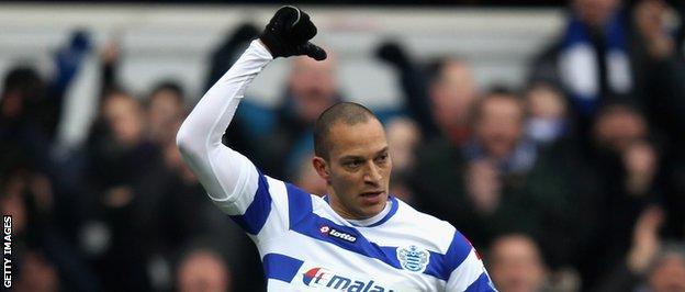 Bobby Zamora points to the name on the back of his shirt