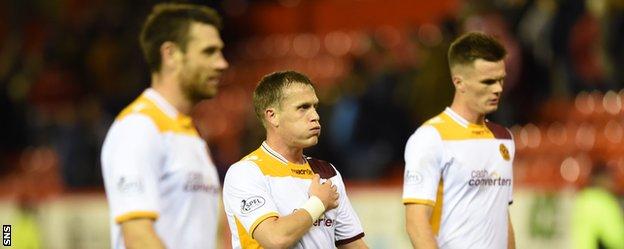 Dejection for Motherwell's Stephen McManus, Stevie Hammell and Craig Reid