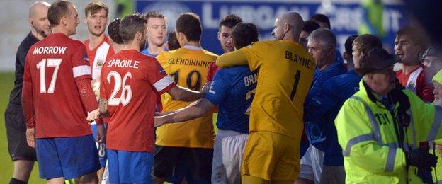 Players got involved in a mass brawl near the end of the match at Mourneview Park