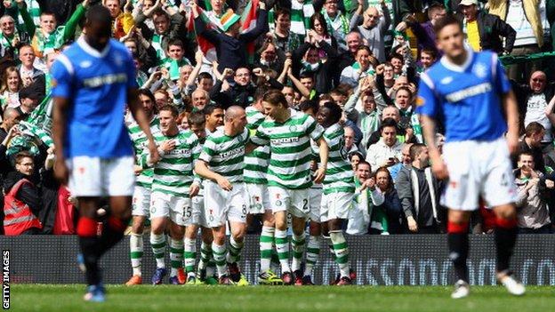 Celtic celebrate as they beat Rangers 3-0 in April 2012