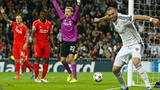 Karim Benzema scores Real Madrid's opener against Liverpool
