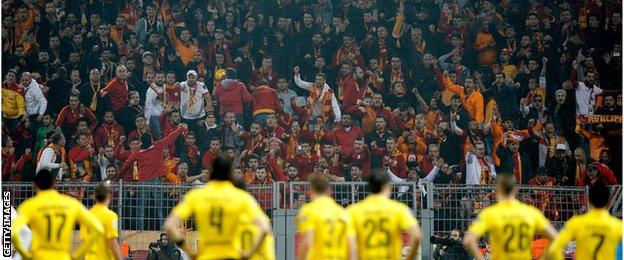 Galatasaray fans light flares at Dortmund