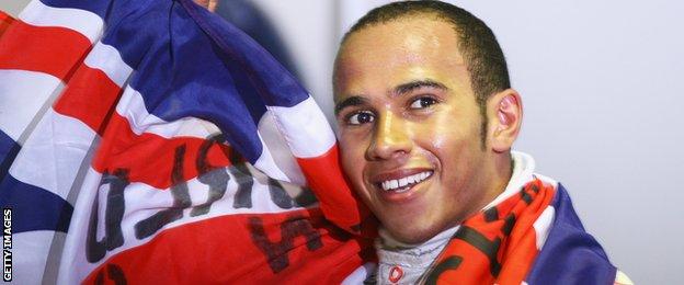 Lewis Hamilton celebrates winning the 2008 World Championship