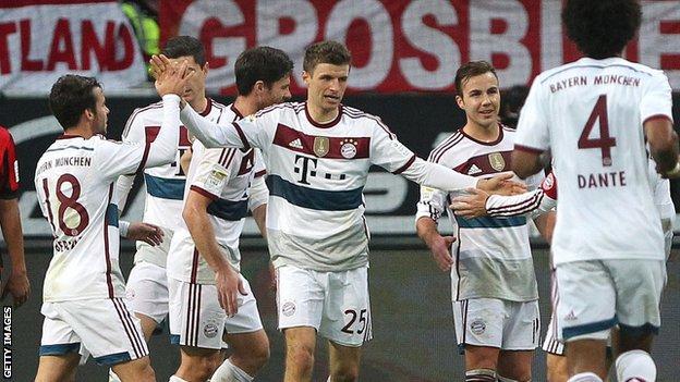 Thomas Muller celebrates with team-mates