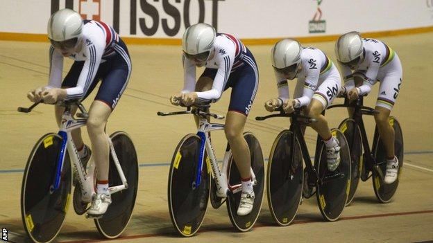 The women's team pursuit squad on their way to gold