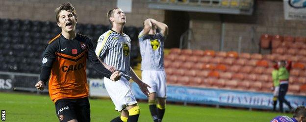 Charlie Telfer scores for Dundee United against St Mirren