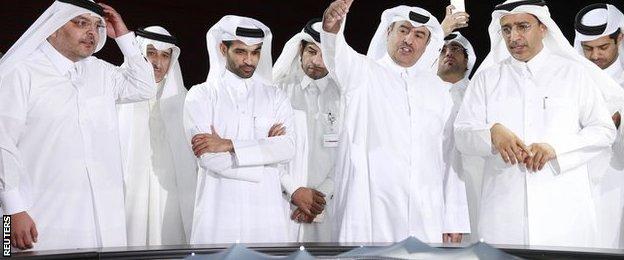 Hassan Al Thawadi (third left) says Qatar is happy to stage the World Cup at any time of year