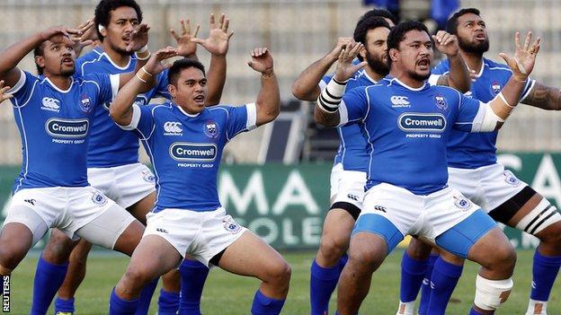 Samoa players perform the Siva Tau ahead of their international rugby test match against Italy