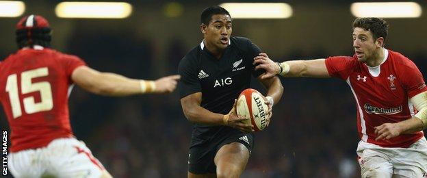 Leigh Halfpenny (left) and Alex Cuthbert (right) try to stop All Blacks wing Julian Savea in Cardiff in 2012
