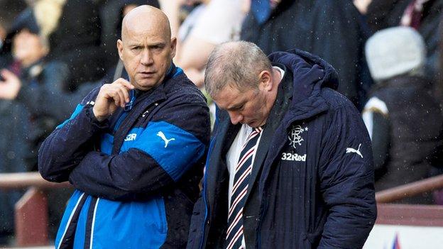 Ally McCoist (right) is under pressure from irate Rangers supporters.