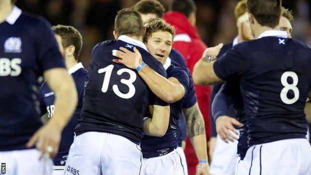 Scotland's Sean Lamont (left) and Chris Cusiter celebrate their win over Tonga.