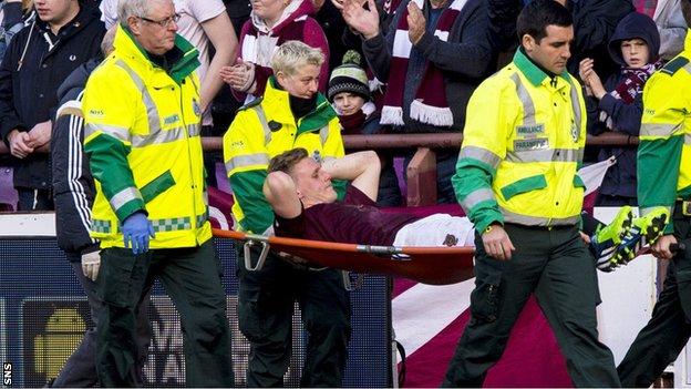 Kevin McHattie is stretchered off at Tynecastle