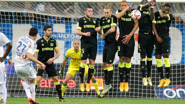 Marseille midfielder Abdelaziz Barrada takes a free-kick against Nantes