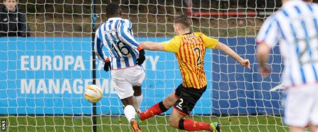 Tope Obadeyi pokes home the opener for Kilmarnock