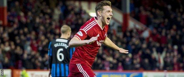 Ash Taylor celebrates after scoring for Aberdeen against Hamilton