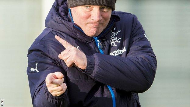 Rangers manager Ally McCoist jokes around during training on Thursday