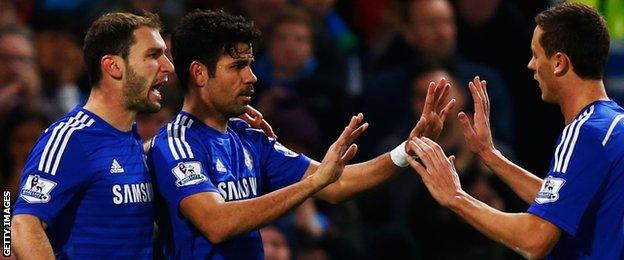 Diego Costa (centre) celebrates