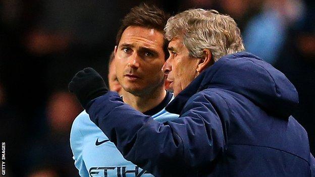 Manchester City manager Manuel Pellegrini (right) and midfielder Frank Lampard