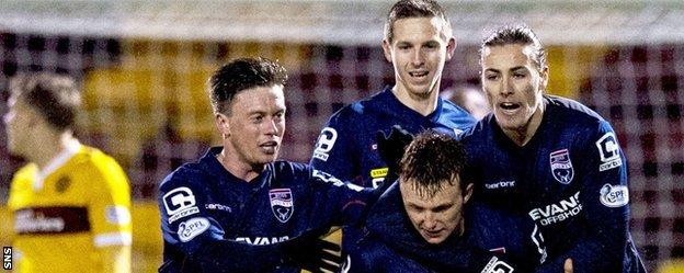 Ross County celebrate their late equaliser at Fir Park