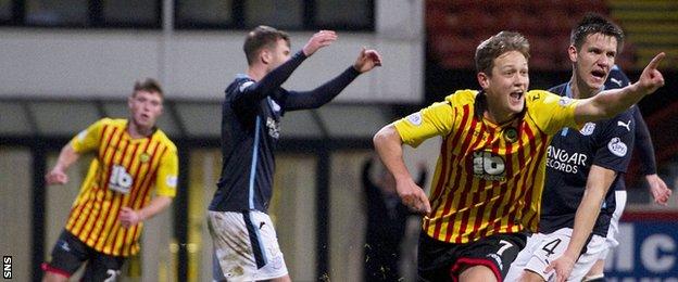 James Craigen celebrates after scoring for Partick Thistle against Dundee