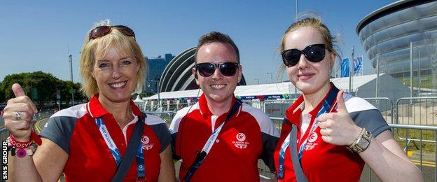 All smiles from Glasgow 2014 Commonwealth Games volunteers Lesley Smith, Michael Riley and Ellie McCarthur