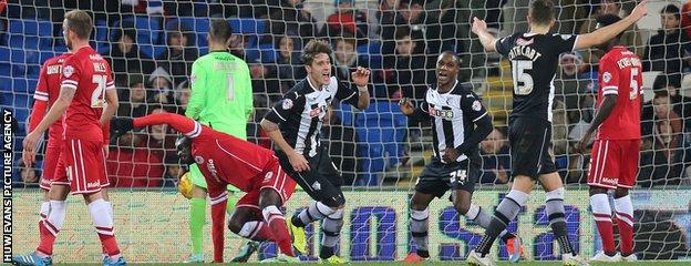 Watford's Gabriele Angella, centre, wheels away to celebrate after he scores the fourth goal