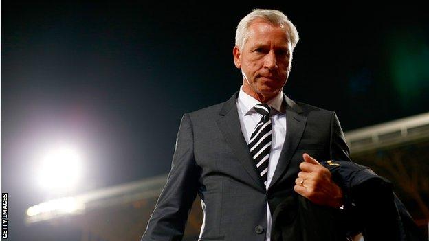 Alan Pardew of Newcastle United looks on prior to the Capital One Cup third round match between Crystal Palace and Newcastle United at Selhurst Park