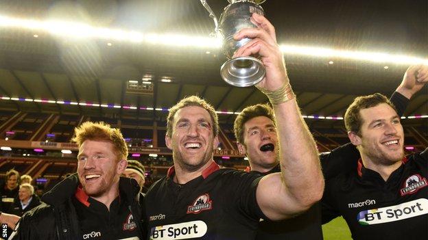 Edinburgh captain Mike Coman lifts the 1872 Cup