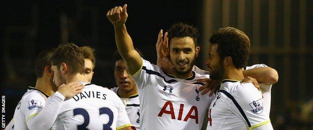 Nacer Chadli (second from right) celebrates