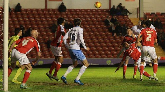Marcus Tudgay heads home Walsall's clinching second goal at Bescot