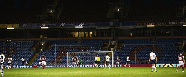 Empty seats at Turf Moor