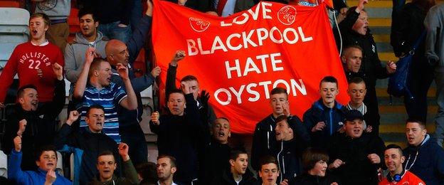 Blackpool fans protest against Karl Oyston during last season's home game against Burnley