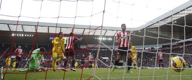 Liverpool wing-back Lazar Markovic (centre) scores for his side at Sunderland