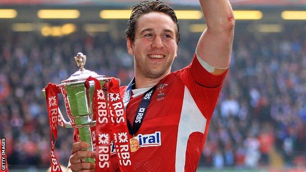 Ryan Jones celebrates Wales' 2012 Grand Slam win with the Six Nations trophy