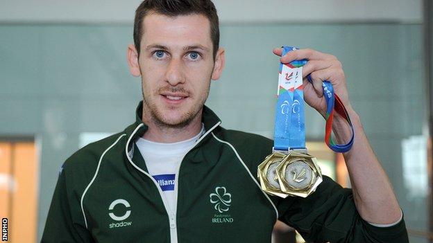 Michael McKillop shows off his two gold medals won at last summer's IPC European Championships in Swansea
