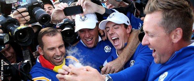 Sergio Garcia, Lee Westwood, Rory McIlroy and Ian Poulter of Europe celebrate winning the Ryder Cup after the Singles Matches of the 2014 Ryder Cup