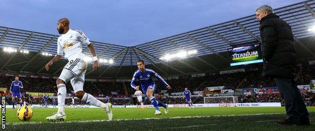Jose Mourinho looks on during his Chelsea side's 5-0 win at Swansea