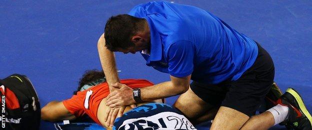 Rafael Nadal gets treatment at last year's Australian Open