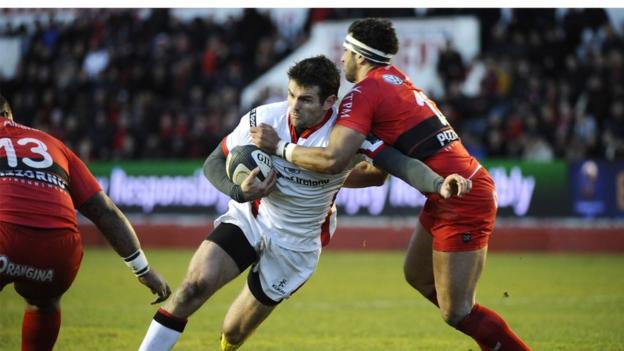 Jared Payne attempts to make ground for Ulster against European champions Toulon at the Mayol Stadium in southern France