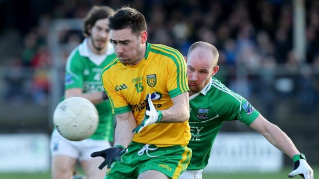 Martin O'Reilly attempts to evade the attention of Conor Quigley during Fermanagh's 2-5 to 0-12 success over Donegal