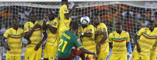 Aurelien Chedjou takes a free-kick