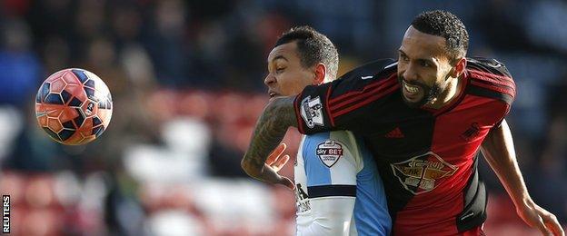 Swansea defender Kyle Bartley (right) was sent off for this challenge on Josh King