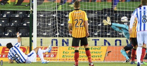Manuel Pascali (left) knocks the ball into the net to give Kilmarnock the lead with 11 minutes left.