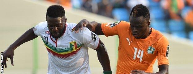 Mali's Bakary Mali's Bakary Sako (left) vies with Ivory Coast's Tiemoko Ismael Diomande