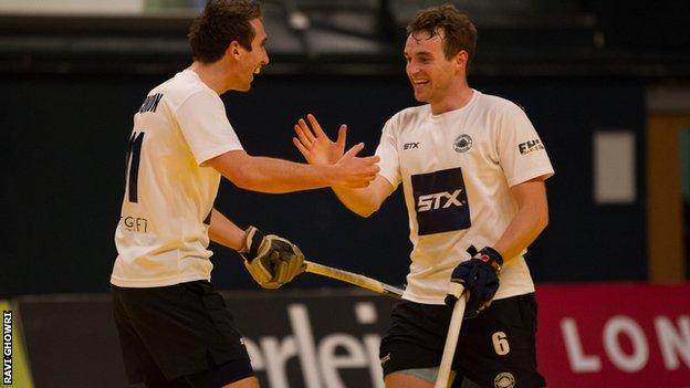 East Grinstead team mates Chris Griffiths and David Condon celebrate a goal in the Hockey 5s final