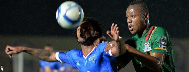 Cape Verde striker Ryan Mendes (left) and defender Stopilla Sunzu of Zambia contest possession